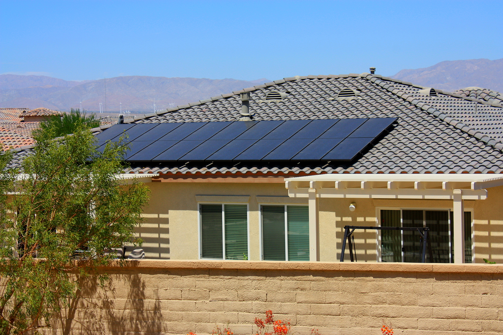 Solar Panels soaking up sunshine in Las Vegas. Learn more about if solar panels add value to your house in this article. 